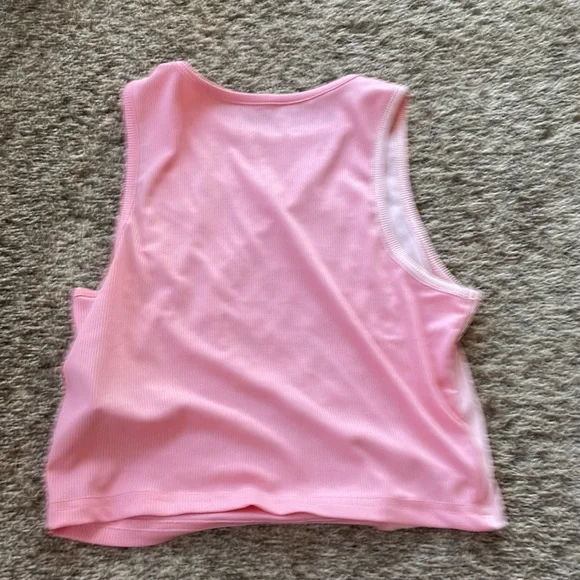 NEW size large but runs more like medium, and a body suit size small.  Lot of 4 - Picture 8 of 9